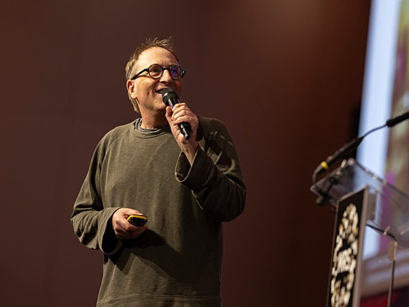 jon ronson on stage at MRS Annual Conference 2026